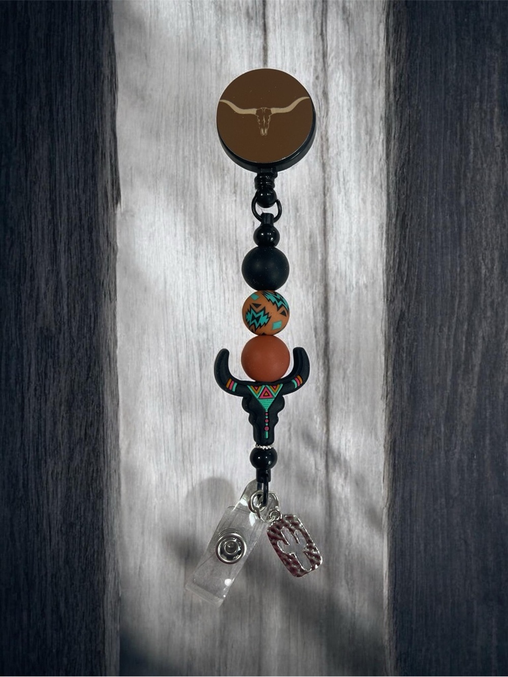 Southwestern Skull Bead Badge Reel - Black & Rust